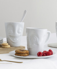 Henkelbecher/ Kaffeebecher mit Gesicht